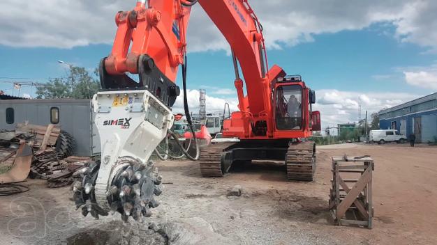 Гусеничный экскаватор с роторной фрезой